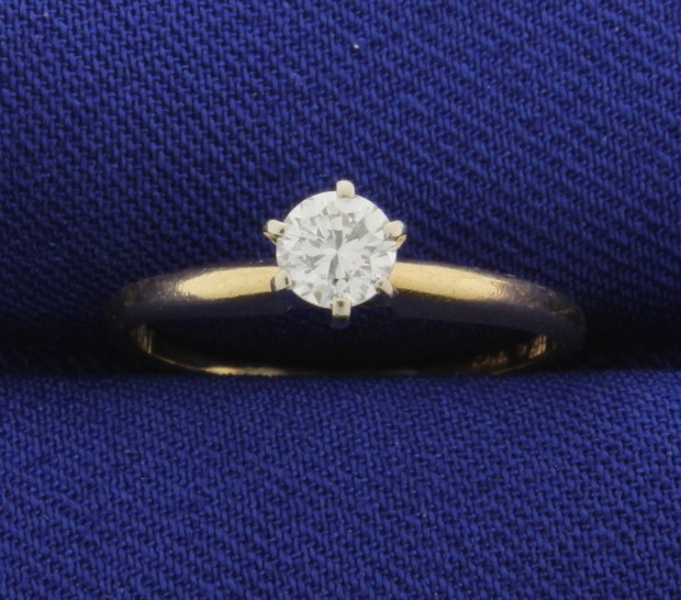 1/4 Carat Diamond Brilliant Solitaire Ring in 14k: The clarity is SI1 and color I. Size 4.5. 1.4g