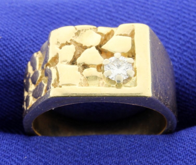 Nugget Style Ring: Attractive 14k yellow gold nugget style ring with a 1/4 carat diamond. The diamond is brilliant cut VS clarity and G color. There is almost 1/2 oz. of 14k gold in this ring! Size 10 14.3g
