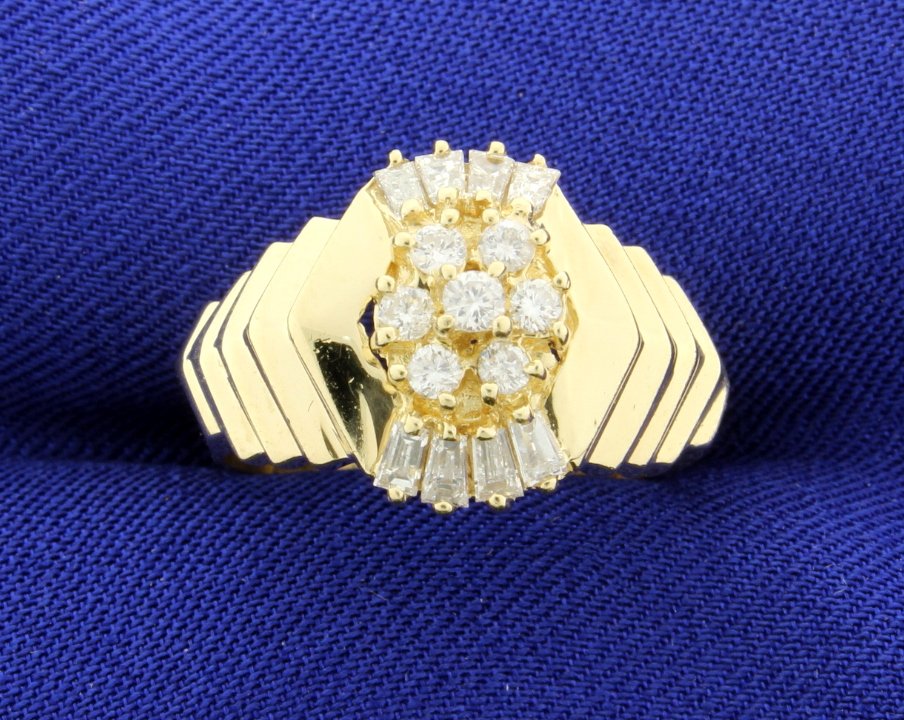 15 Diamond Cluster 14k Ring: The diamonds are brilliant cut and tapered baguettes and weigh 3/4 ct TW with I1 clarity and H-I-J color. Size 7. 5.1g