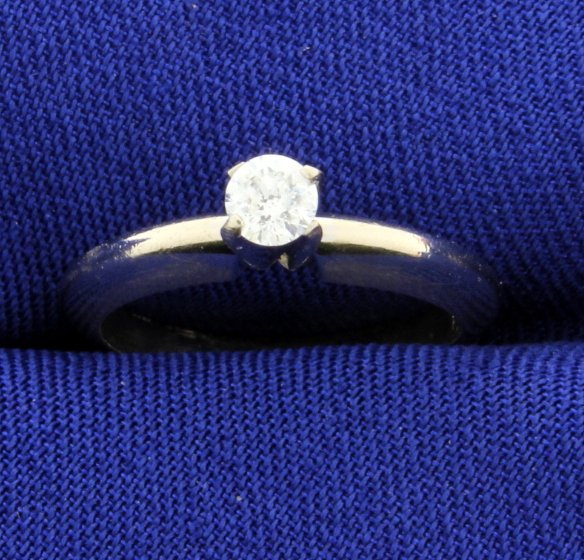 Diamond 14k Solitaire Ring: The diamond is brilliant cut, 0.19ct, SI2-I1 clarity, H color. Size 4. 1.5g