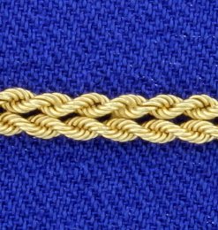 Double Rope Chain Bracelet: In 14K yellow gold, it is 7 1/4 inches long and 2.2mm thick. 3.3g