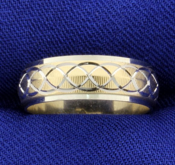 Wedding Band Ring: This ring is 10K yellow & white gold and has a great design all the way around! Size 7 3.7g
