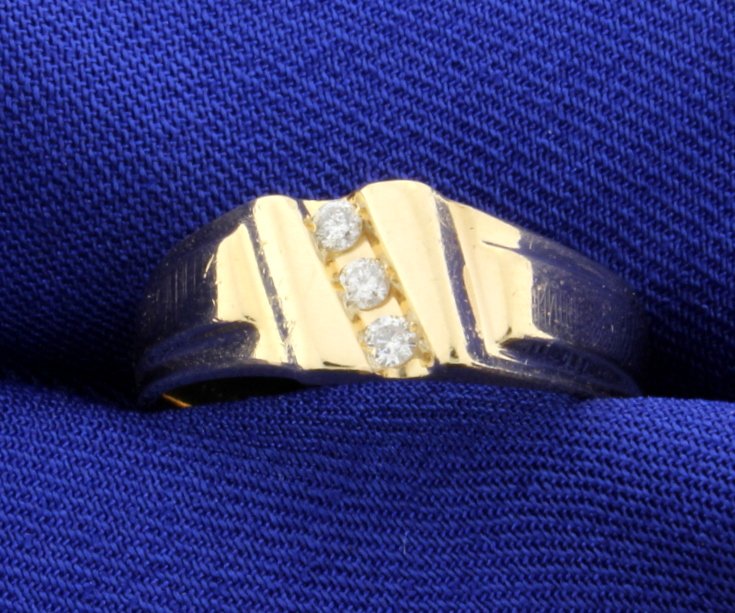 3 diamond 14k yellow wedding band: 3 diamond 14k yellow wedding band, There are 3 bill cut diamonds, total weight 0.10 cts. The ring is 7 1/2mm at top and tapers to approx mm in the back. The diamonds are SI clarity and G-H color. Size