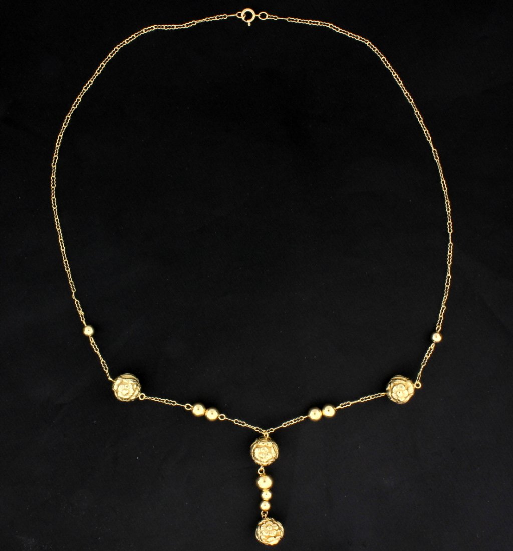 Ball Chain Necklace: 14K yellow gold the chain is 17.5 inches long with a 1.5 inch pendant on bottom. The balls have beautifully detailed flower design. 3.6g
