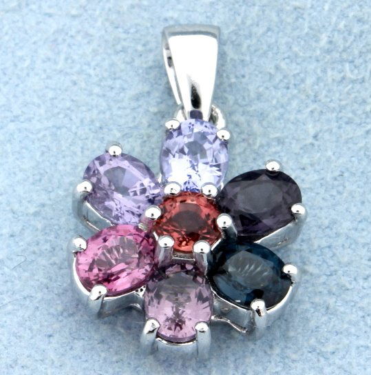 Multi color Spinel pendant: This beautiful 14k white gold flower shaped multi color Spinel pendant has over 3 carats of gems - 6 ovals and 1 round. NO CHAIN 3.9g