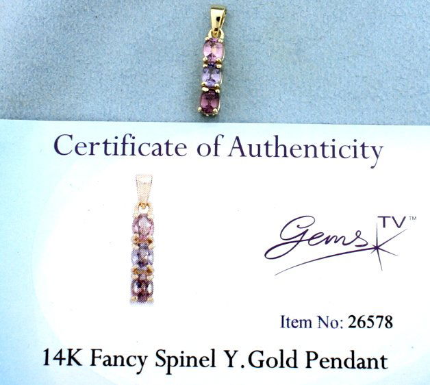 Fancy Spinel Gold Pendant: This beautiful 14k yellow gold pendant hold 3 gorgeous Fancy Spinel gems that total 0.676 carats. This piece was originally purchased from Gems TV and comes with Certificate of Authenticity. NO CHAIN