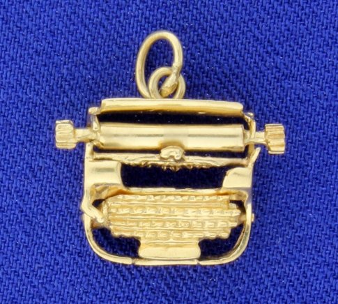 Typewriter Charm: The charm is 14K yellow gold, and is 1/2 inch long. 2.5g