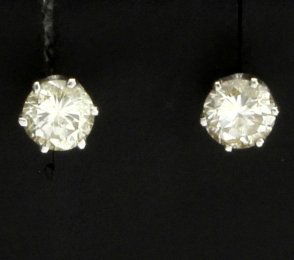 1/2ct TW Diamond Stud Earrings: In 14K white gold, the diamonds are SI1/I color, earrings have screw on posts for safety. .8g