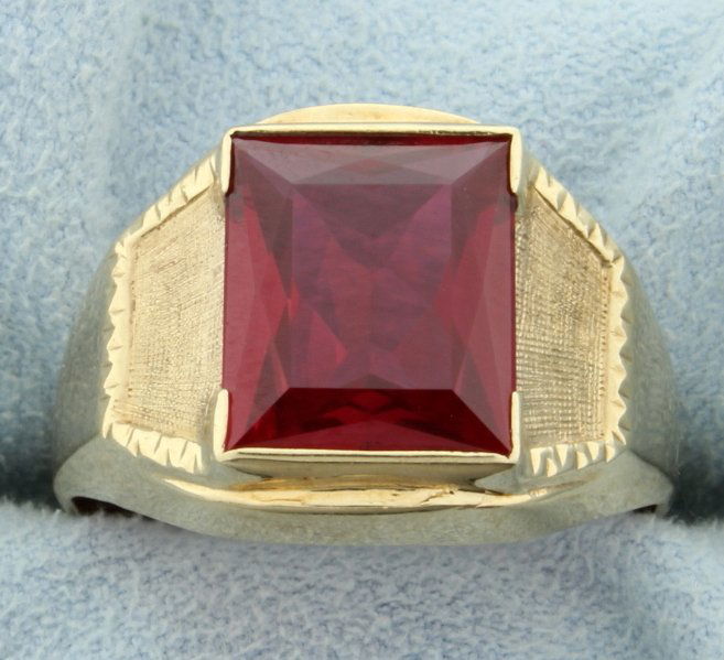 Men's 5ct Lab Ruby Ring: In 10K yellow gold, the 5ct ruby has excellent color and clarity. Size 12 1/2 6.4g