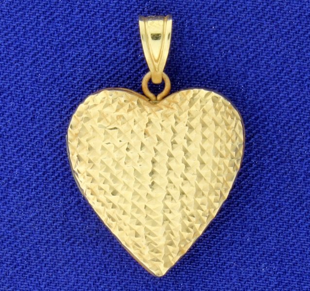 Diamond Cut Heart Locket Pendant: 14K yellow gold, it is 1 inch long with bale. 3.5g
