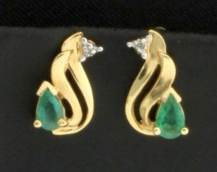 Emerald & Diamond Earrings: These earrings are 14K yellow gold and contains two 1/2pt diamonds & two 1/4 ct pear shaped natural emeralds, they have beautiful color! The earrings are 1/2 inch long. 1.6g
