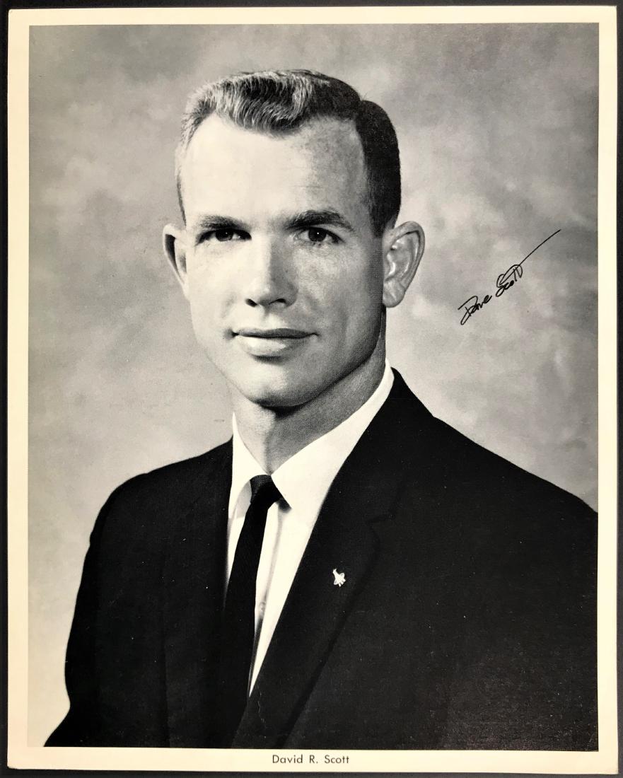 David Randolph Scott. Signed Inscribed Photo.: David Randolph Scott (1932)Signed Inscribed Photo - Official NASA Photo Photo signed by David Scott. With Scott's name printed to bottom. Attached is a sheet with biographical information hand-written
