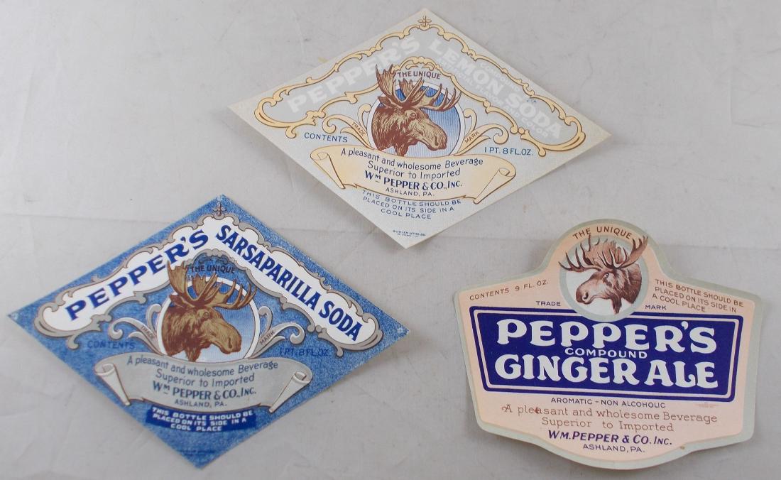 Group of 3 Different Very Old Pepper's Soda Labels with: One is for Pepper's Sarsaparilla, one is for Compound Ginger Ale, and the other is for Lemon Soda. These are old stone lithos from around the 1910s.