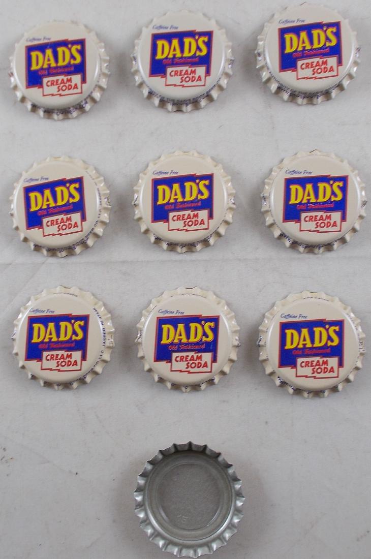 Group of 10 Dad's Cream Soda Plastic Lined Soda Caps: Fancy colorful old logo. Unused old stock in great condition found at the Dad's Root Beer Co. in Jasper, Indiana.