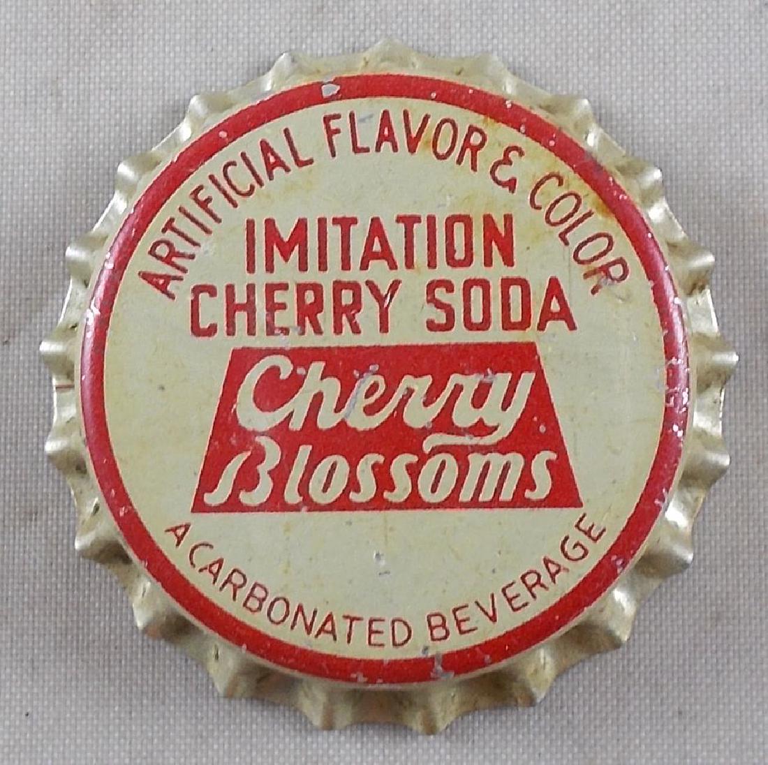 Cherry Blossoms Imitation Cherry Soda cork bottle cap.: This is a scarce cap. They are unused and in nice shape with minor color aging.