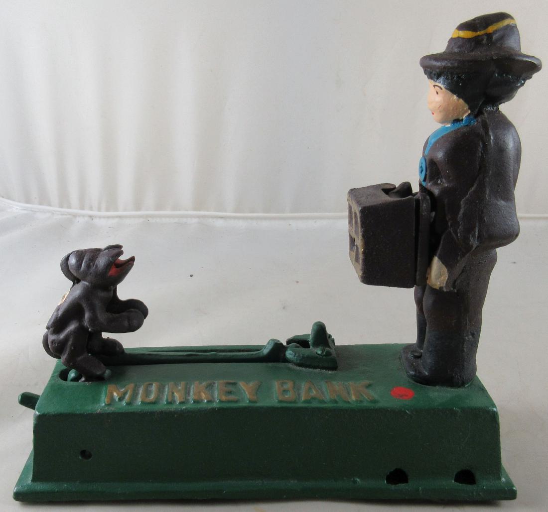 Monkey Mechanical Bank – Reproduction: Works, but sometimes need to wiggle the monkey before pressing the button.