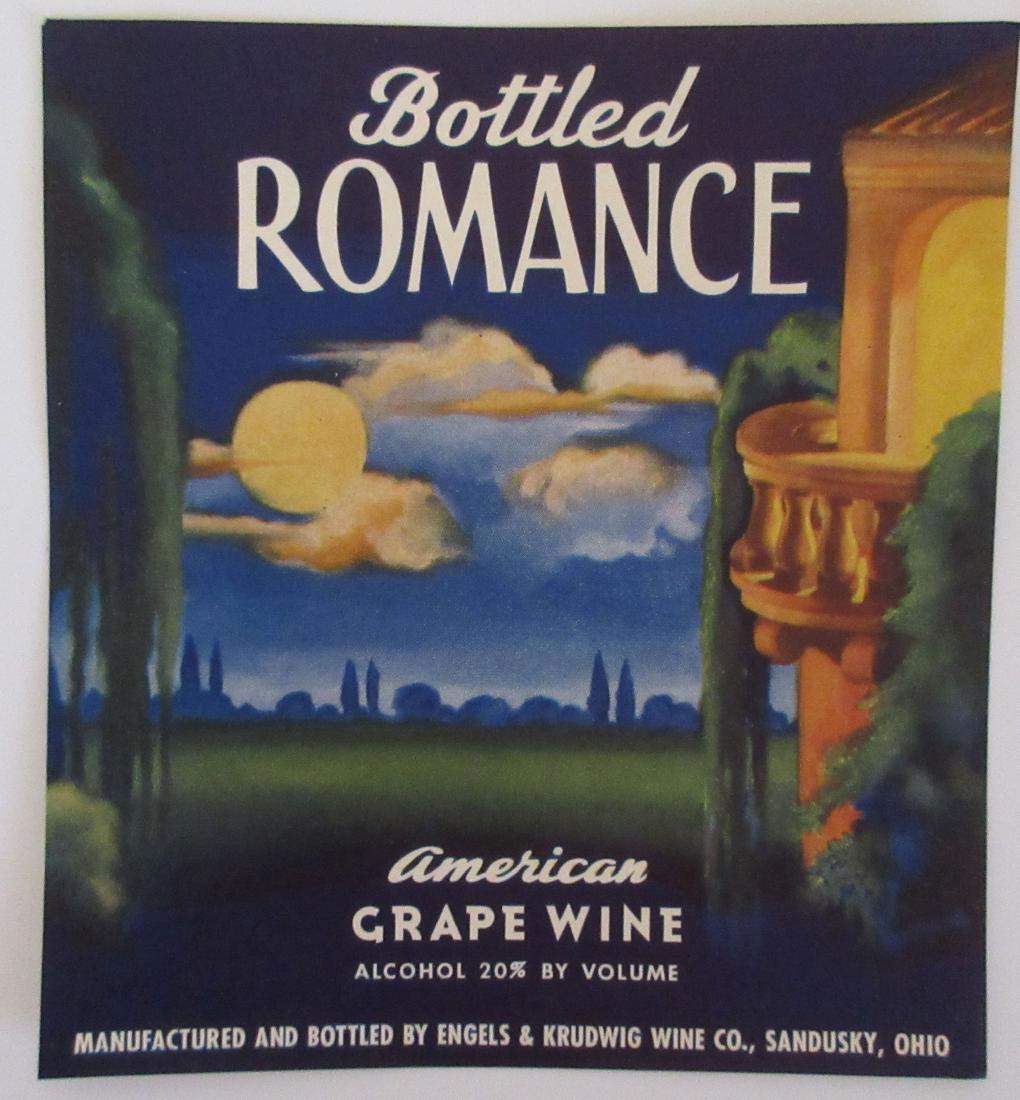 Bottled Romance Grape Wine Label - Artwork by R.: The label pictured is one of their earliest known surviving bottle labels from Engels & Krudwig who produced high quality American wine from the Lake Erie region vineyards. 5”