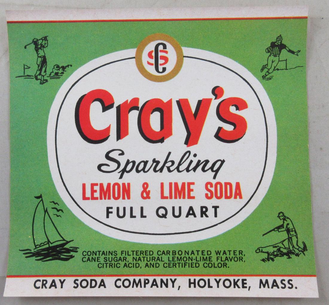 Cray's Sparkling Lemon & Lime Soda Bottle Label 4-1/4”.: Pictures a golfer, hunter with dog and gun, football player, and boat. Excellent unused condition from Cray Soda Company in Holyoke, Mass.
