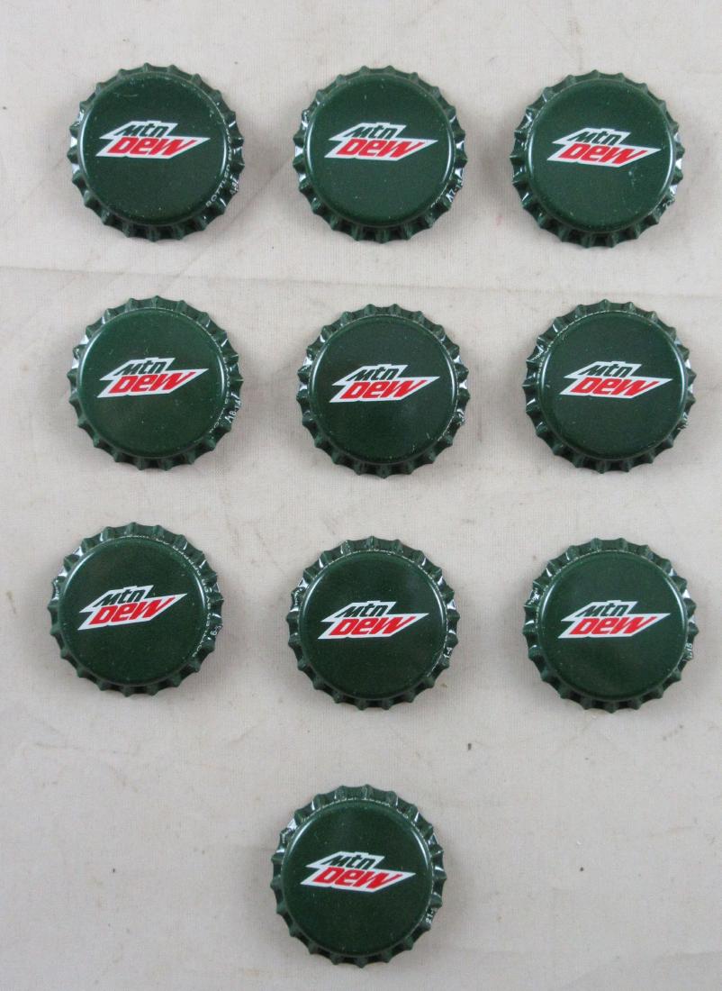 Lot of 10 Deep Green Mountain Dew Plastic Lined Soda: Unused old stock in great condition found at the Dr. Pepper Bottling plant in Jefferson, NC.