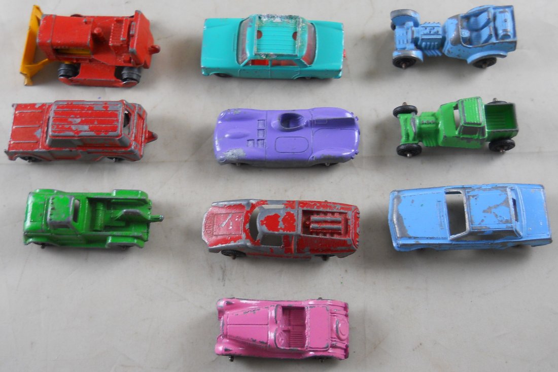 10 Vintage Diecast Toy Vehicles. Tootsie Toy, Lesney: 2 are not marked and there are 2 which we cannot discern the maker's mark.