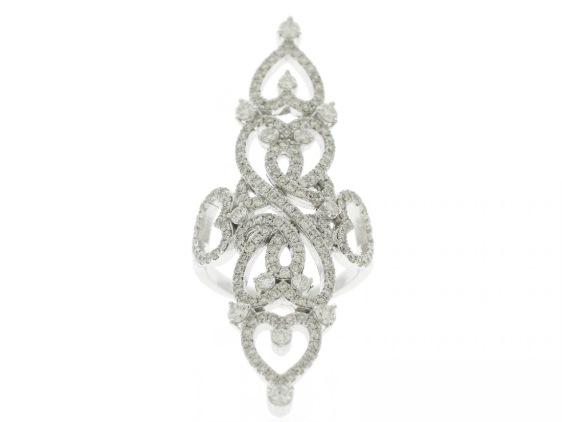 14 KT White Gold Diamond Edwardian Design Long Ring: This 14kt gold ring has 9.09 gms of gold and 1.98cts of diamonds incorporated into this long Edwardian era designed ring.