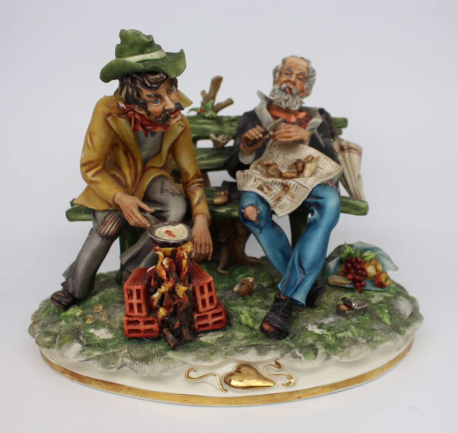 Capodimonte Tramps On Bench By Cortese: Title: Capodimonte Tramps on Bench by Cortese Description: Capodimonte Tramps on Bench by Cortese Capodimonte, made in Italy. Mid/late 20th century. Signature of the artist