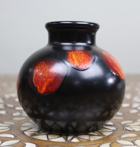 Vintage Poole Pottery Vase â€“ Black Glaze with Red/Orange Motifs (1 of 3)