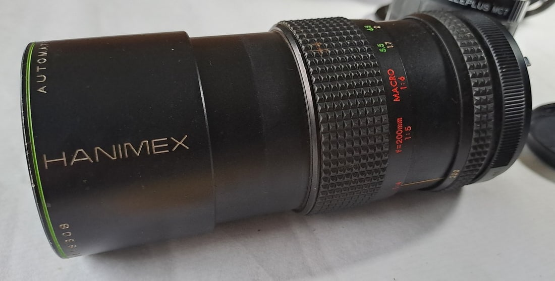 Olympus Zuiko 50mm f/1.8 + Hanimex Telephoto Zoom + Minolta AF 2× Teleplus MC7 - 7