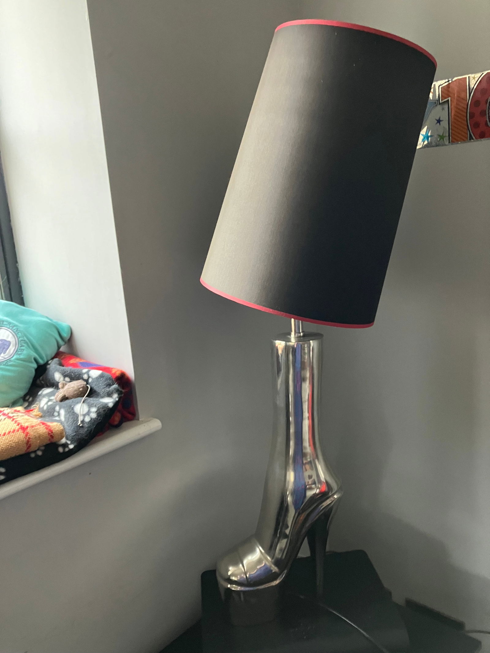 Boot Fashion Lamp: Title: Boot Fashion Lamp Description: Excellent condition. Purchased in the Netherlands hence plug. Perfect working order. Chrome chunky boot and black with a red rim