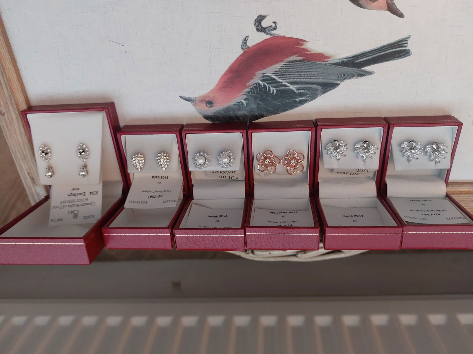 Stunning Earrings x 6 Pairs: Title: Stunning Earrings x 6 Pairs Description: 6 pairs of stunning earrings. All unworn. There is 1 stone missing from one earring. All designer items from Richard Designs, a UK company. 