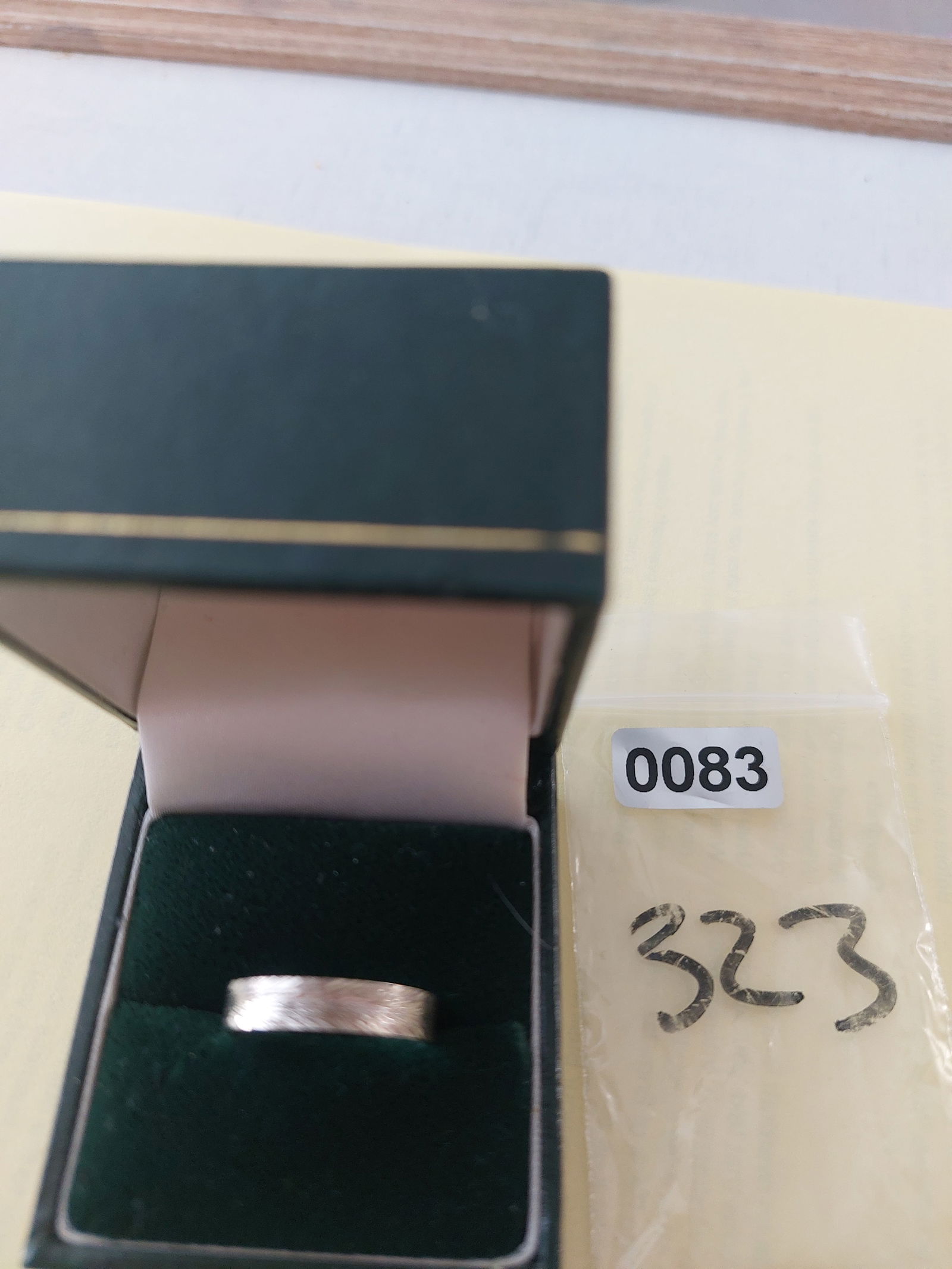Wedding Band Code 323/83 Ex Display: Title: Wedding Band Code 323/83 Ex Display Description: Silver machine engraved lady's wedding band 3 mm This ring has not been worn but was an ex display ring so may have