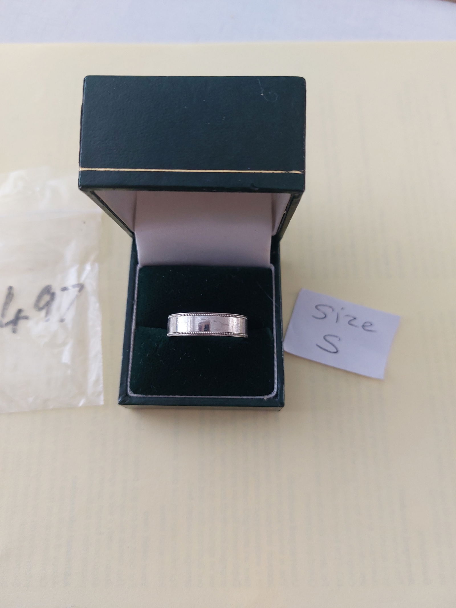Wedding Band Code 497 Ex Display: Title: Wedding Band Code 497 Ex Display Description: Sterling silver men's 4 mm wedding band with fancy diamond cut engrave. This ring has not been worn but it was a shop samp