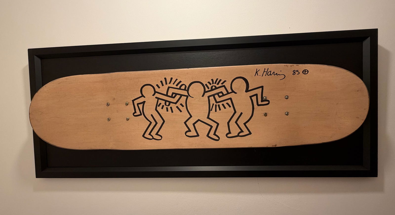 Keith Haring (1958–1990), “Untitled.” Three Figures, 1985. Black Marker On Skatebo: Title: Keith Haring (1958–1990), “Untitled.” Three Figures, 1985. Black Marker On Skateboard Deck. Signed Description: Keith Haring (1958–1990), “Untitl