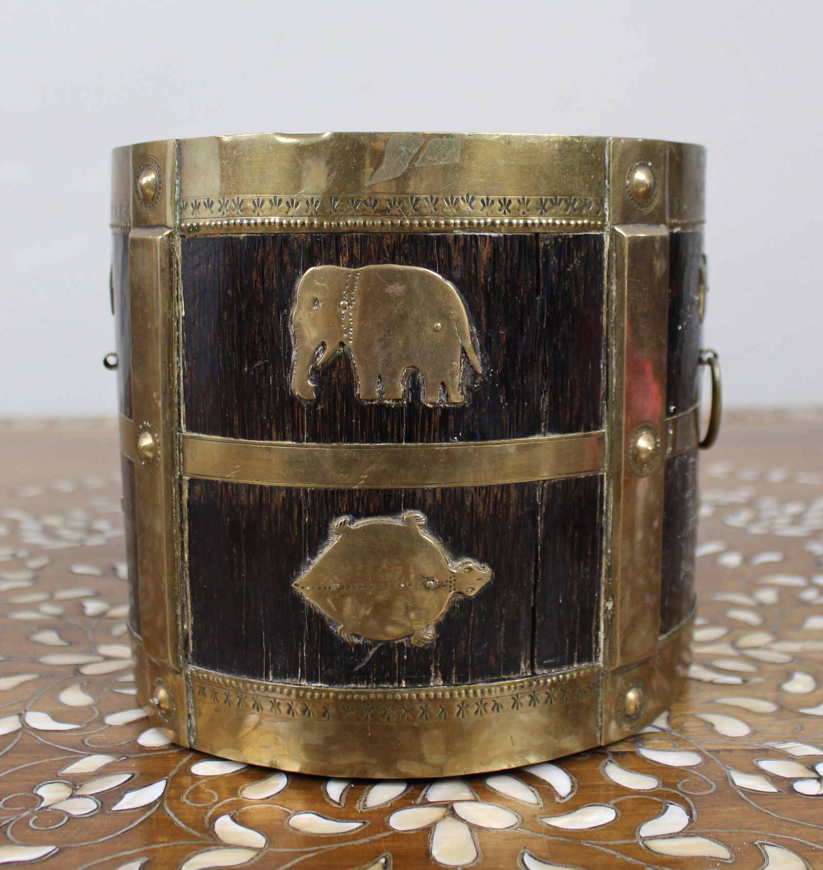 Early 20th Century Indian Brass-Mounted Wooden Bucket with Zodiac Animal Motifs: Title:Early 20th Century Indian Brass-Mounted Wooden Bucket with Zodiac Animal Motifs Description: Early 20th Century Indian Brass-Mounted Wooden Bucket with Zodiac Animal Motifs An early 20th