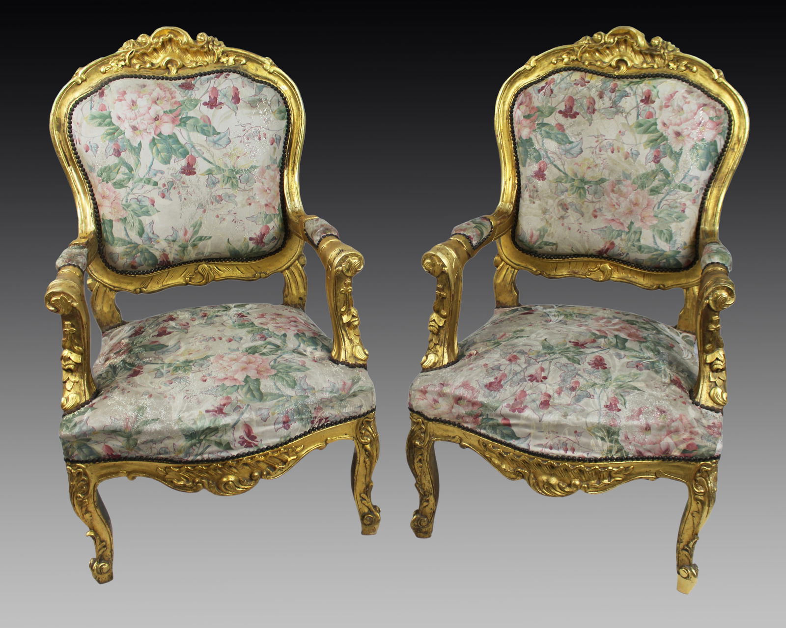 Pair of Vintage Carved Giltwood Louis XV Style Upholstered Armchairs: Title:Pair of Vintage Carved Giltwood Louis XV Style Upholstered Armchairs Description: Pair of Louis XV Style Italian Giltwood Fauteuils with Floral Upholstery Mid/Late 20th Century A decorative