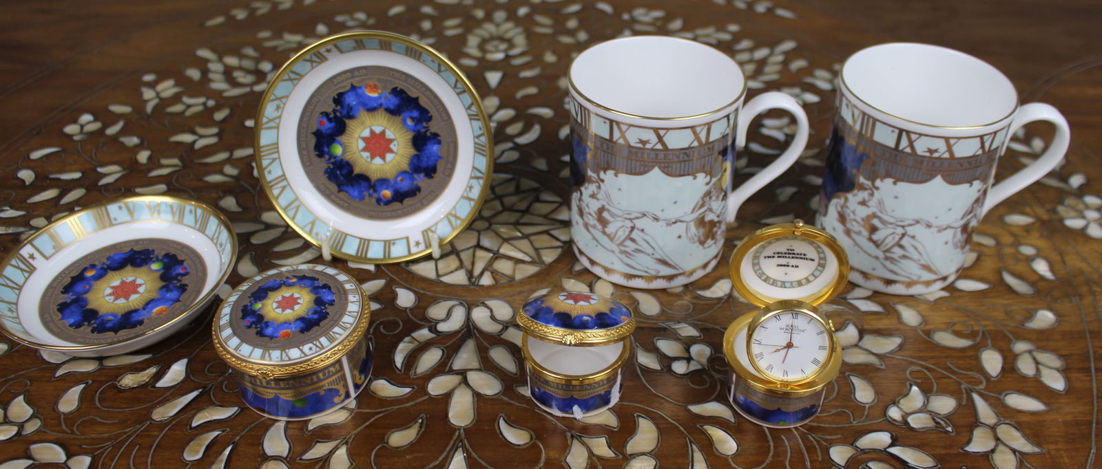 Collection of Royal Worcester Millennium Pieces: Title:Collection of Royal Worcester Millennium Pieces Description: Collection of Royal Worcester Millennium Pieces A mixed group of Royal Worcester Millennium items, all marked “To Celebrate
