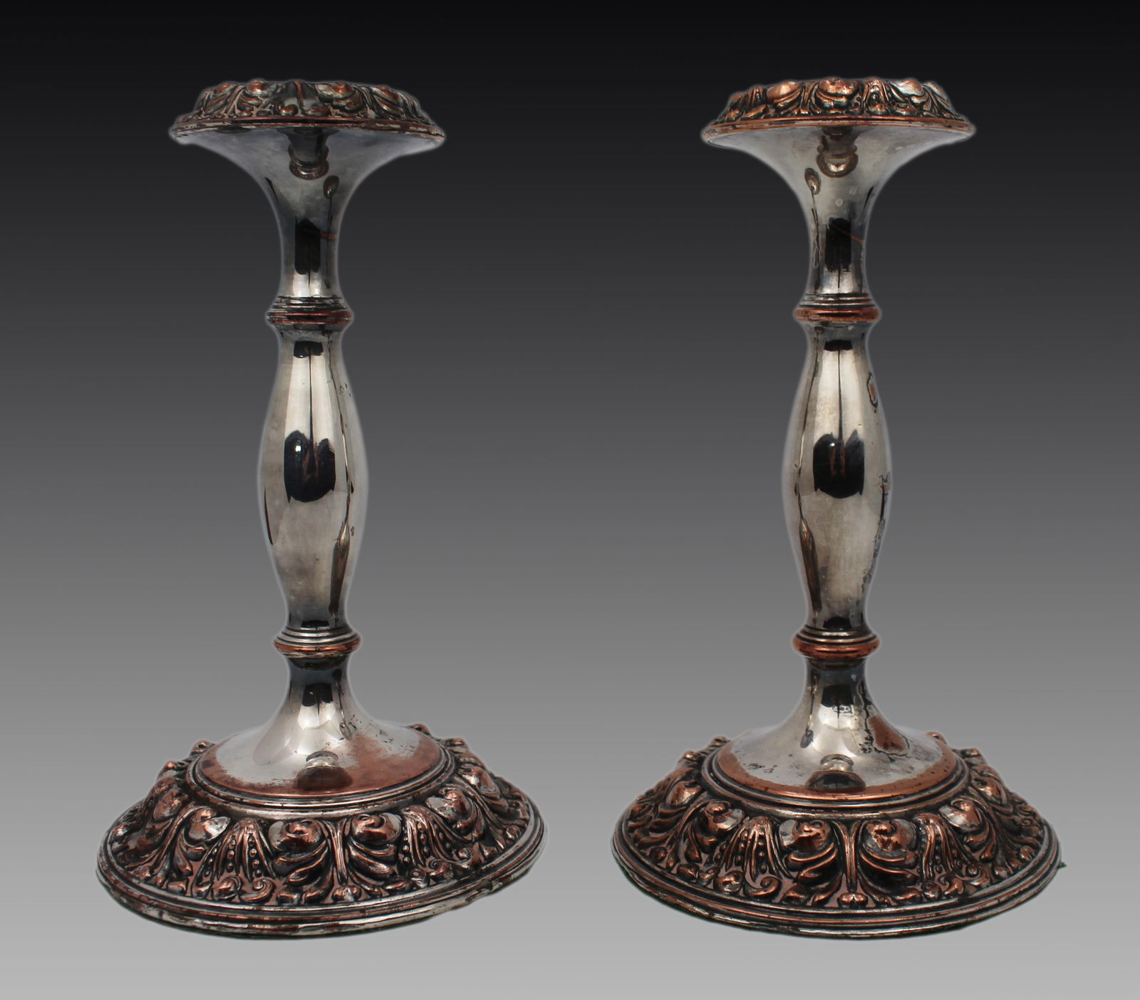 Pair of Antique Sheffield Plate Candlesticks: Title:Pair of Antique Sheffield Plate Candlesticks Description: Pair of Antique Sheffield Plate Candlesticks A good pair of 19th-century Sheffield plate candlesticks, of classic baluster form with