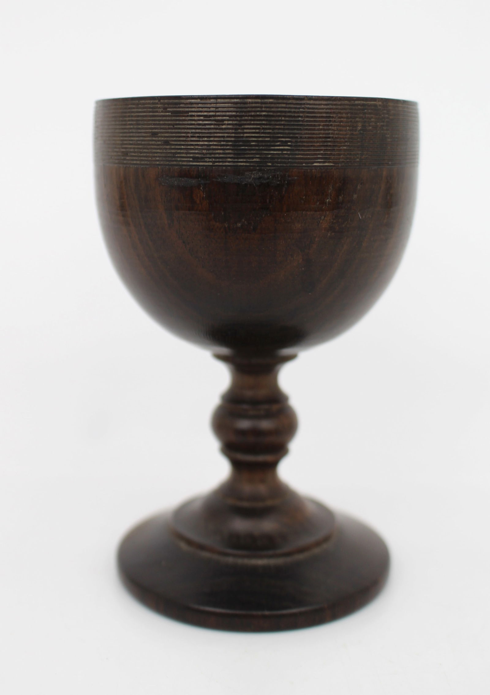 Turned Wooden Goblet, 19th Century: Title:Turned Wooden Goblet, 19th Century Description: Turned Wooden Goblet, 19th Century A modestly sized turned wooden goblet, likely dating to the 19th century. Made from a dark hard