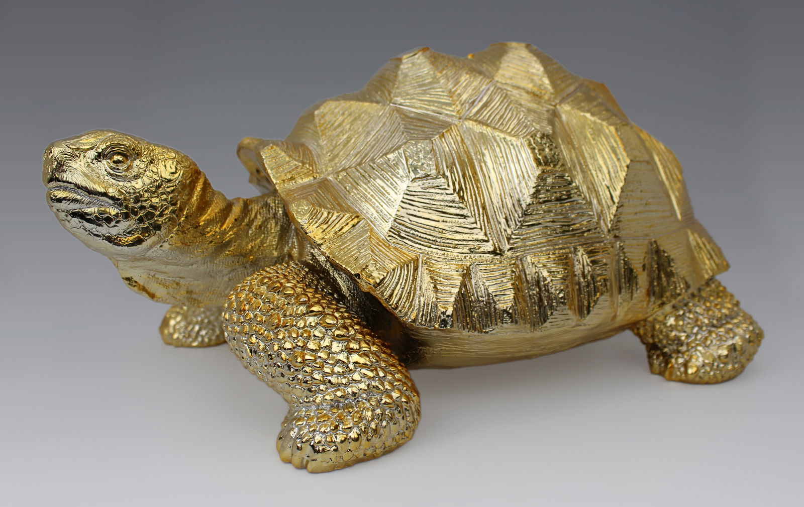 Gold Leaf Tortoise Model: Title:Gold Leaf Tortoise Model Description: Gold Leaf Tortoise Model Measures 38 x 24 x 19 (height) cm Excellent condition Condition: Used