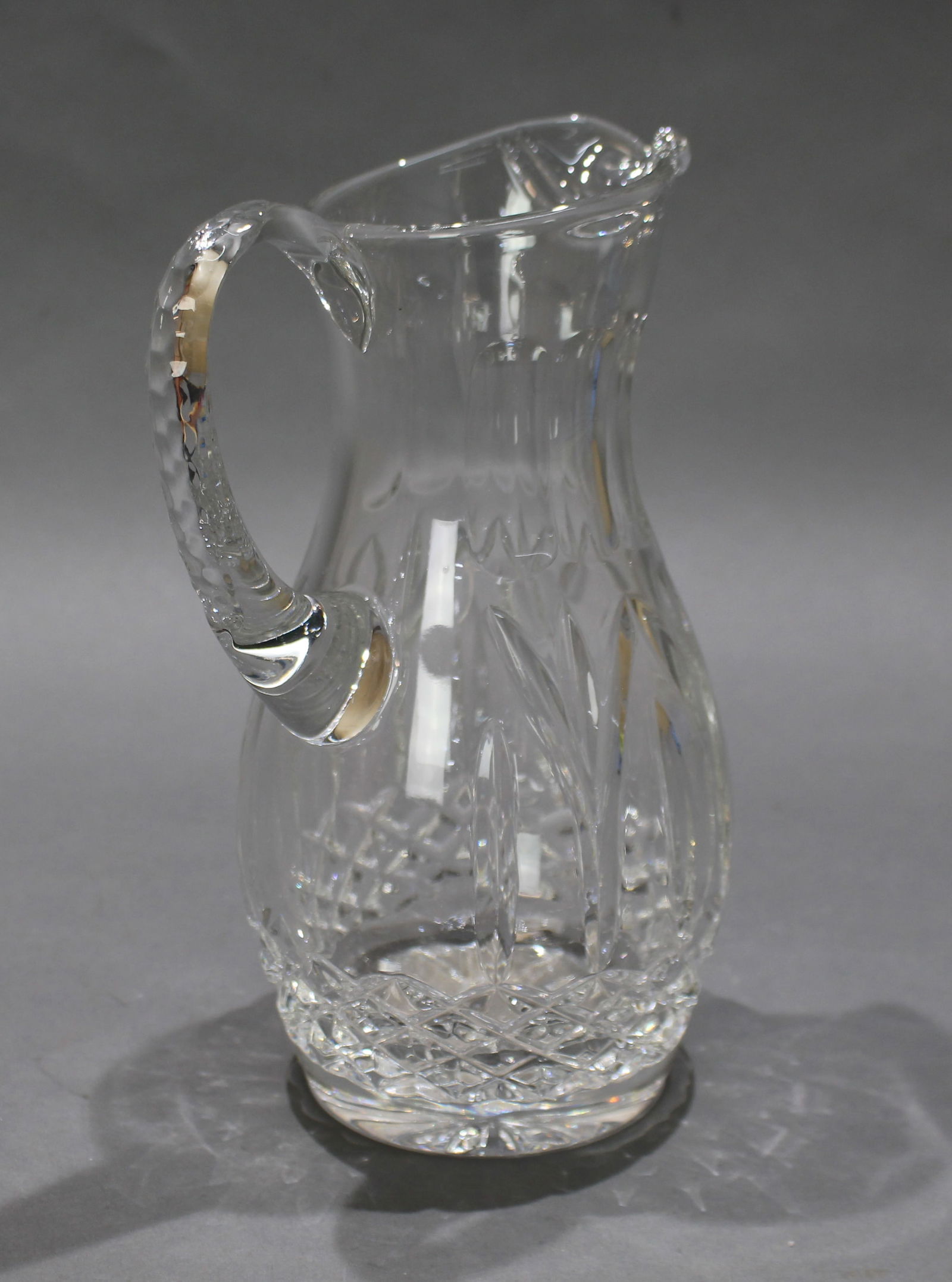 Vintage Crystal Cut Glass Tall Jug: Title:Vintage Crystal Cut Glass Tall Jug Description: Vintage Crystal Cut Glass Tall Jug. 20th century. Height: 23 cm. Good vintage conditon; light scratches and minor air bubbles