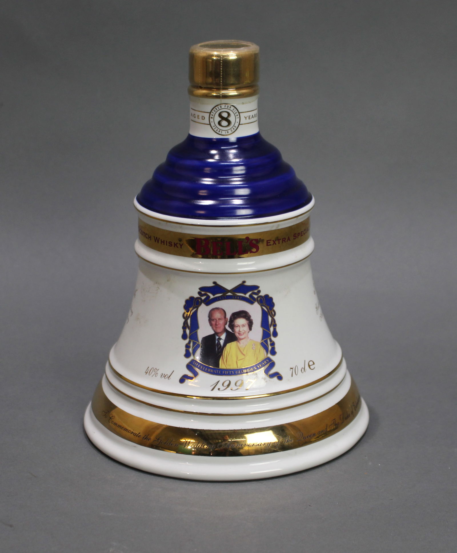 Bell's Old Scotch Whisky Commemorative 1997 Royal: Title:Bell's Old Scotch Whisky Commemorative 1997 Royal Description: Arthur Bell & Sons. Old Scotch Whisky. Genuine Wade porcelain decanter. 50th Golden Wedding Anniversary. Full with original