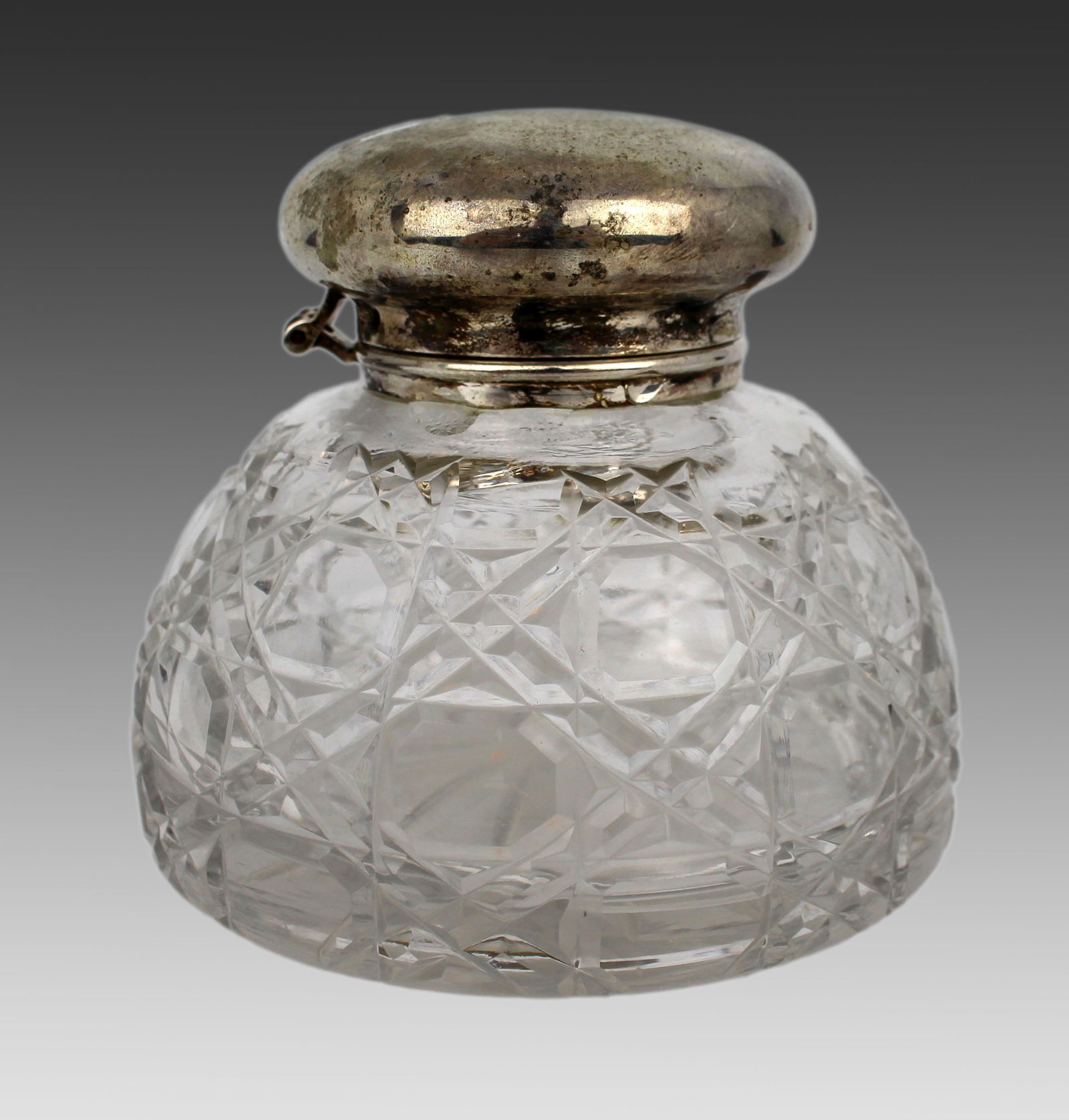 Vintage Silver Plated Crystal Inkwell: Title:Vintage Silver Plated Crystal Inkwell Description: Vintage Silver Plated Crystal Inkwell Vintage, 20th century Cut glass crystal body with hinged silver plated top Measures 11 x 11 x 10
