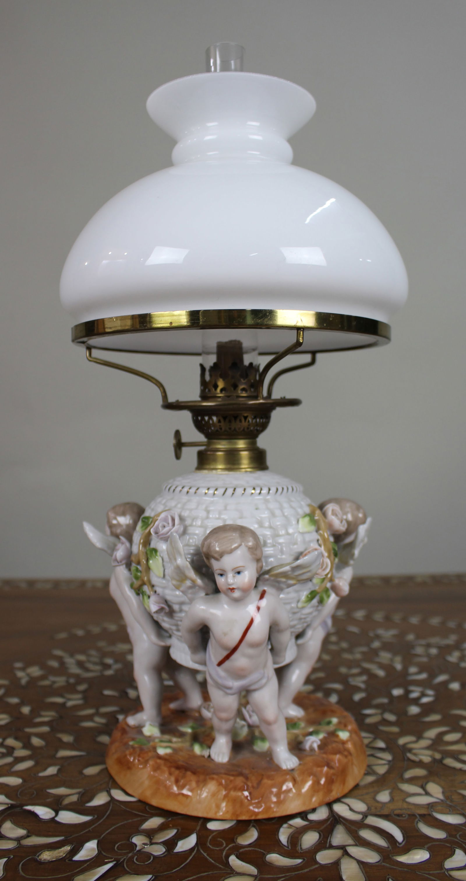 Dresden Porcelain Oil Lamp with Cherubs, c.1890: Title:Dresden Porcelain Oil Lamp with Cherubs, c.1890 Description: Dresden Porcelain Oil Lamp with Cherubs, c.1890 A decorative late 19th century porcelain oil lamp dating to around 1890. The base