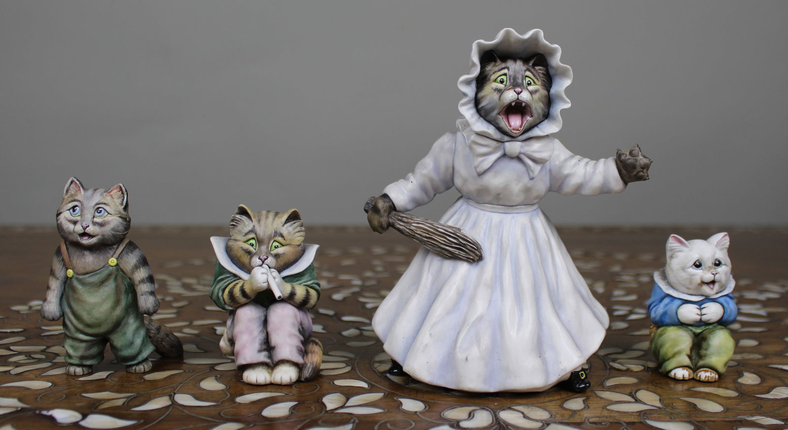 Collection of 4 Avalon Fine Bone China Cat Figurines: Title: Collection of 4 Avalon Fine Bone China Cat Figurines Description: Collection of 4 Avalon Cat Figurines. One of the smaller cats with glued damaged repair