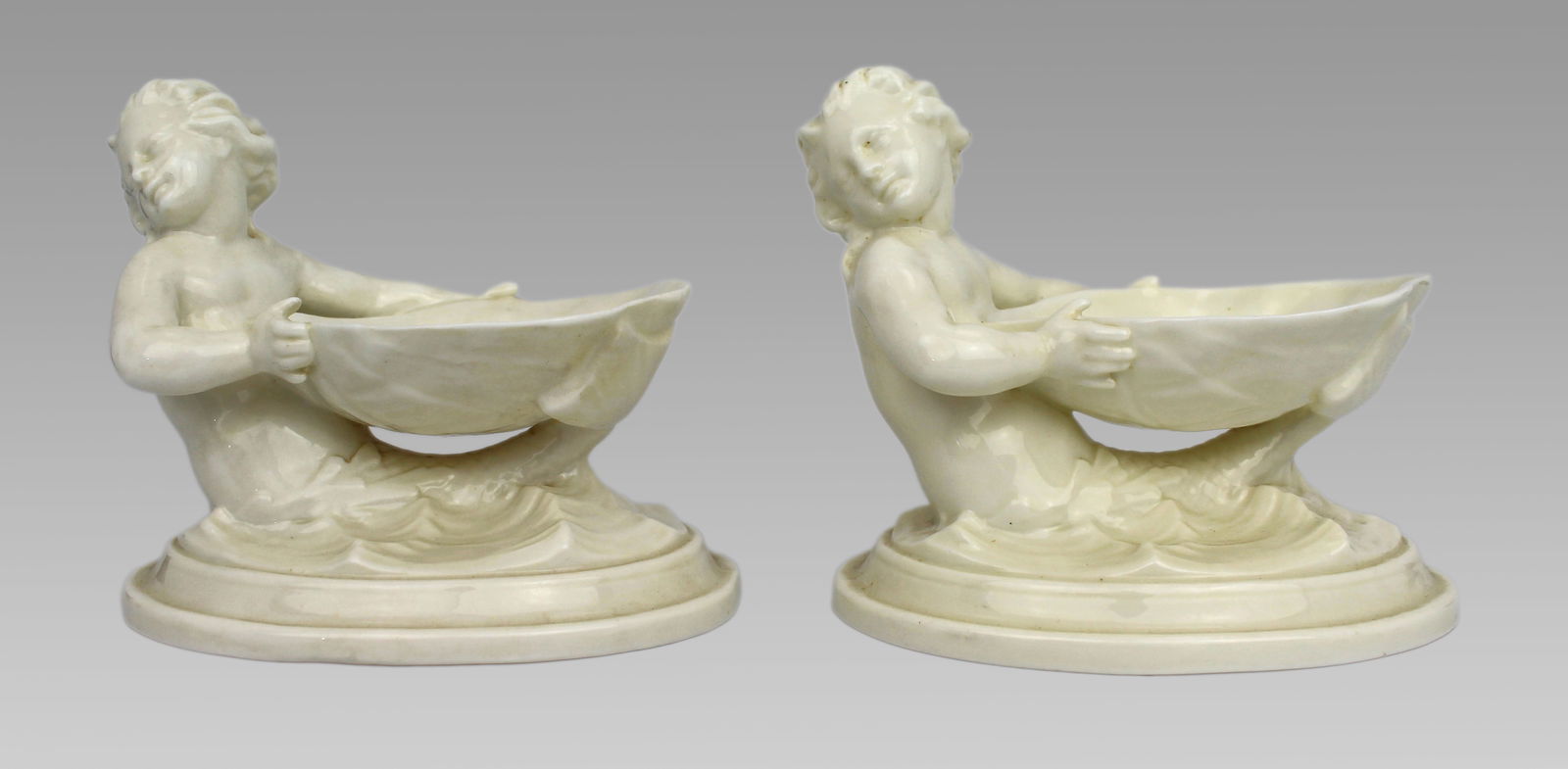 Pair of Royal Worcester Blanc de Chine Merchild Salt Cellars: Title: Pair of Royal Worcester Blanc de Chine Merchild Salt Cellars Description: Pair of Royal Worcester Blanc de Chine Merchild Salt Cellars, Model 349, England, 1962–63 Descript