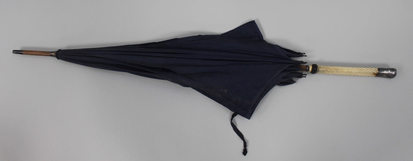 Antique Umbrella wih Silver Ferrule: Title: Antique Umbrella wih Silver Ferrule Description: Antique Umbrella with Silver Ferrule Condition: Used Location Category: Antiques"