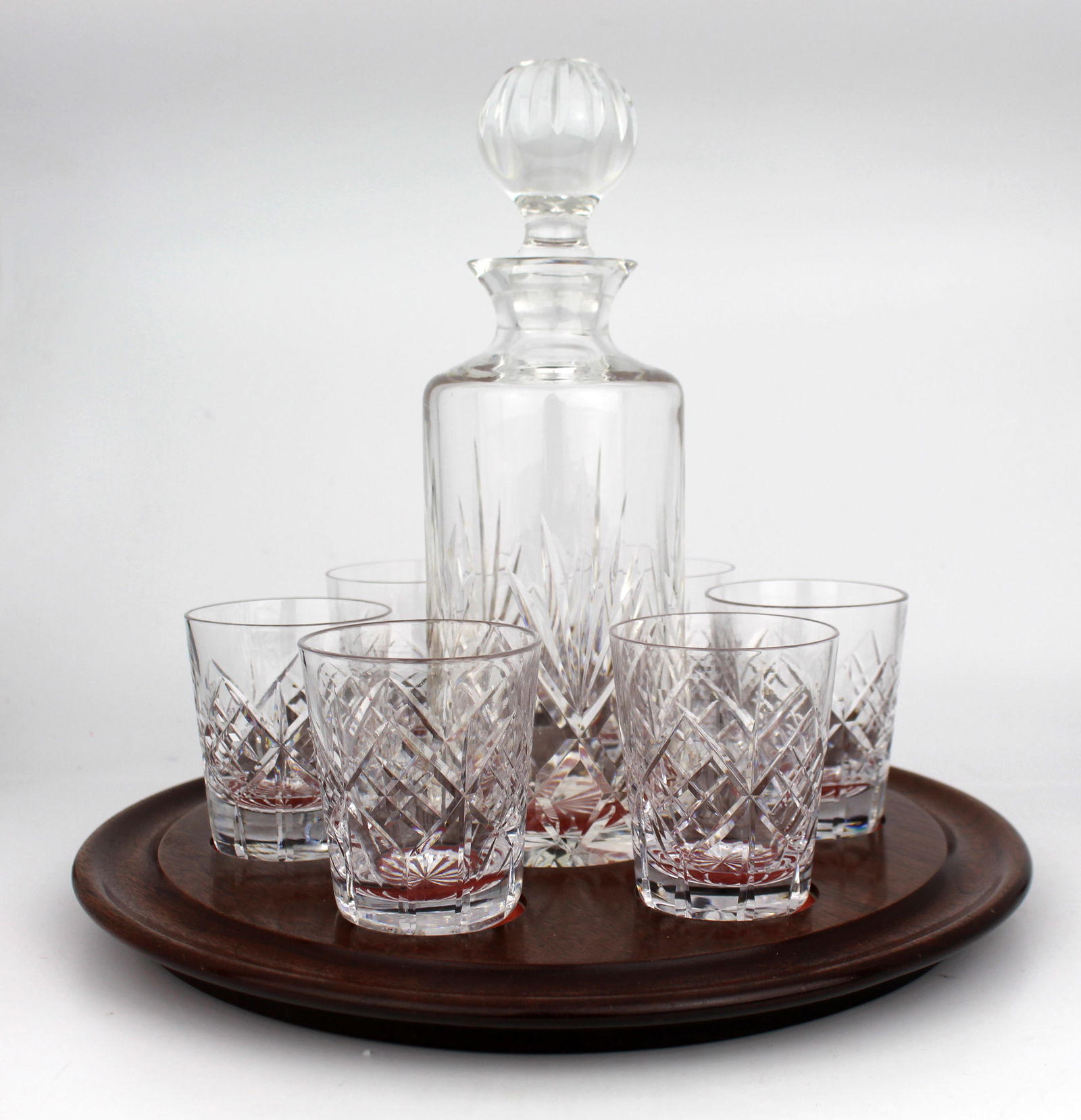 Cut Glass Crystal Decanter & 6 Glasses on Mahogany Stand: Title: Cut Glass Crystal Decanter & 6 Glasses on Mahogany Stand Description: Cut Glass Crystal Decanter & 6 Glasses on Mahogany Stand Condition: