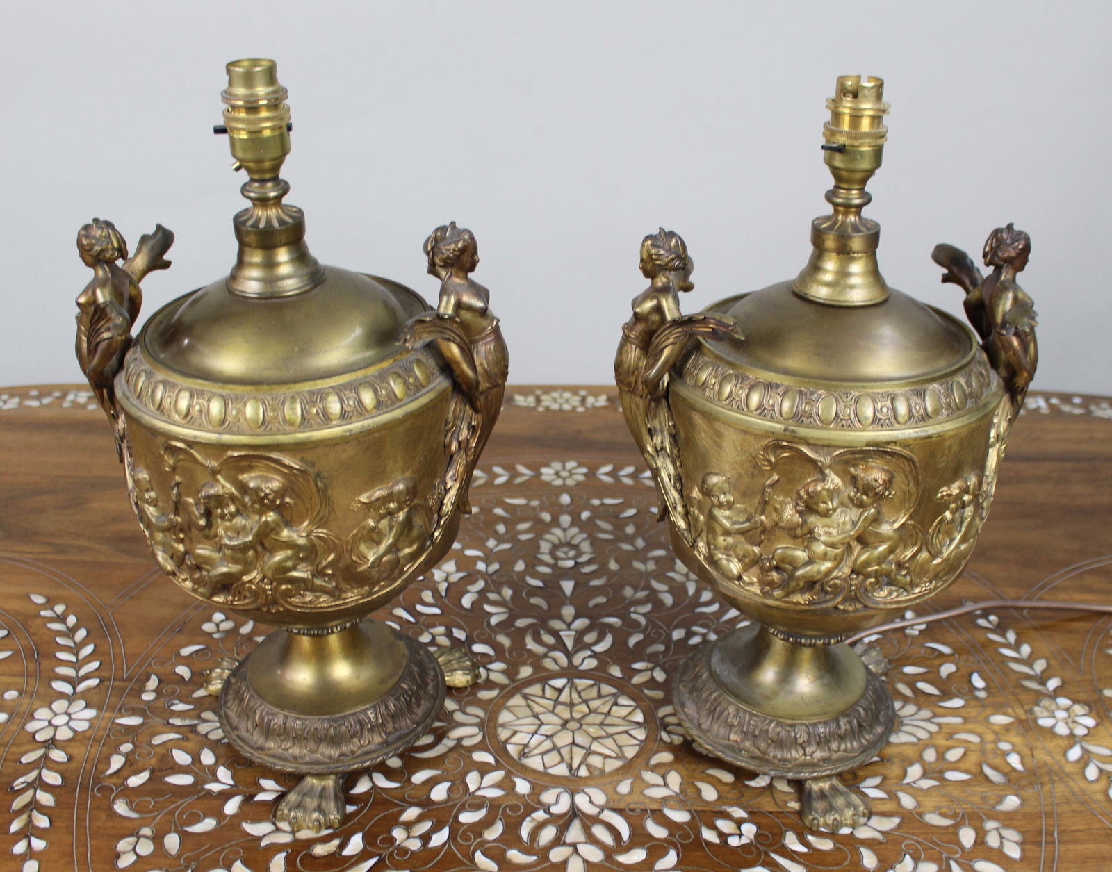 Pair of French Gilt Bronze Urn Lamps with Putti Reliefs, circa 1900 - 2