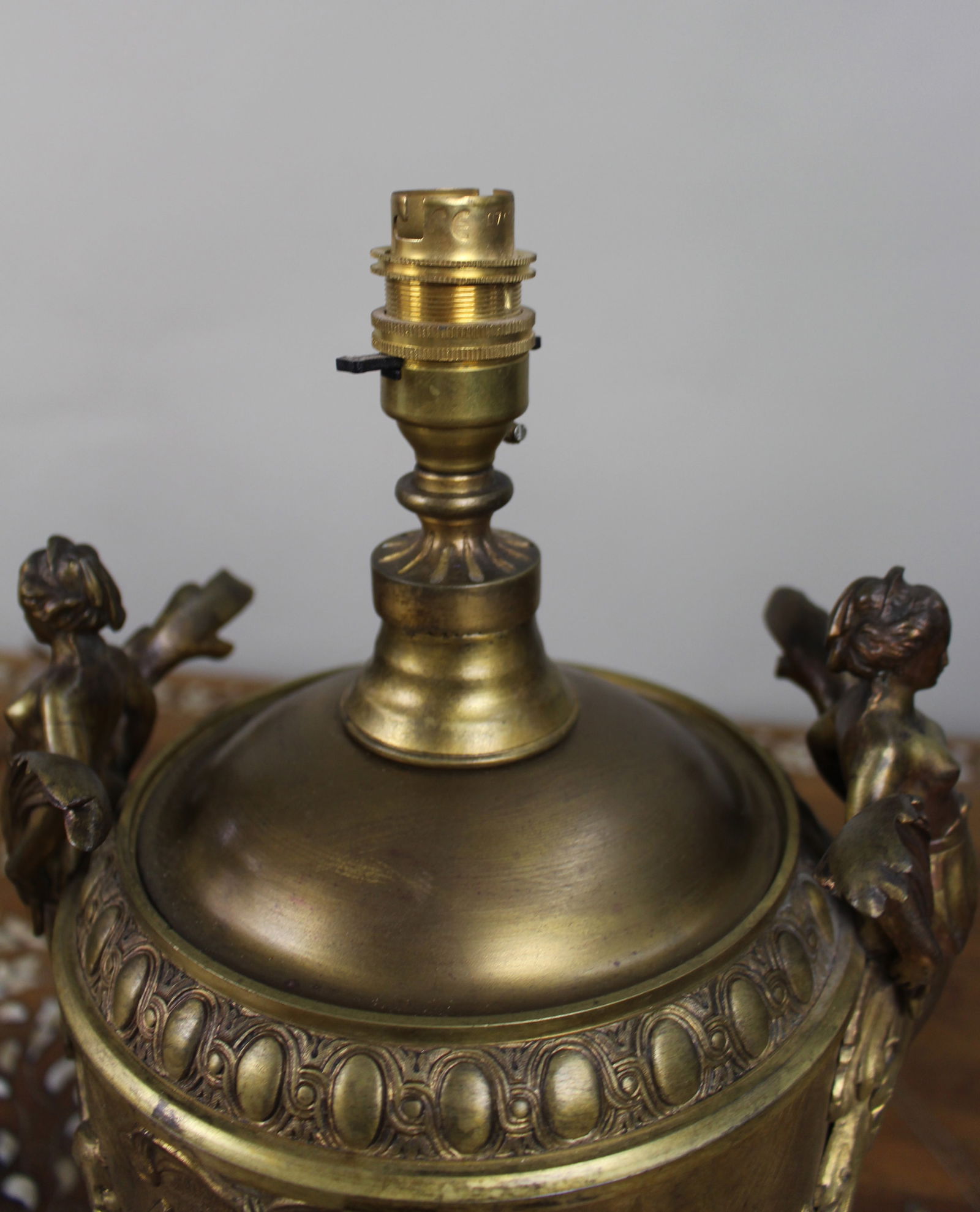 Pair of French Gilt Bronze Urn Lamps with Putti Reliefs, circa 1900 - 9