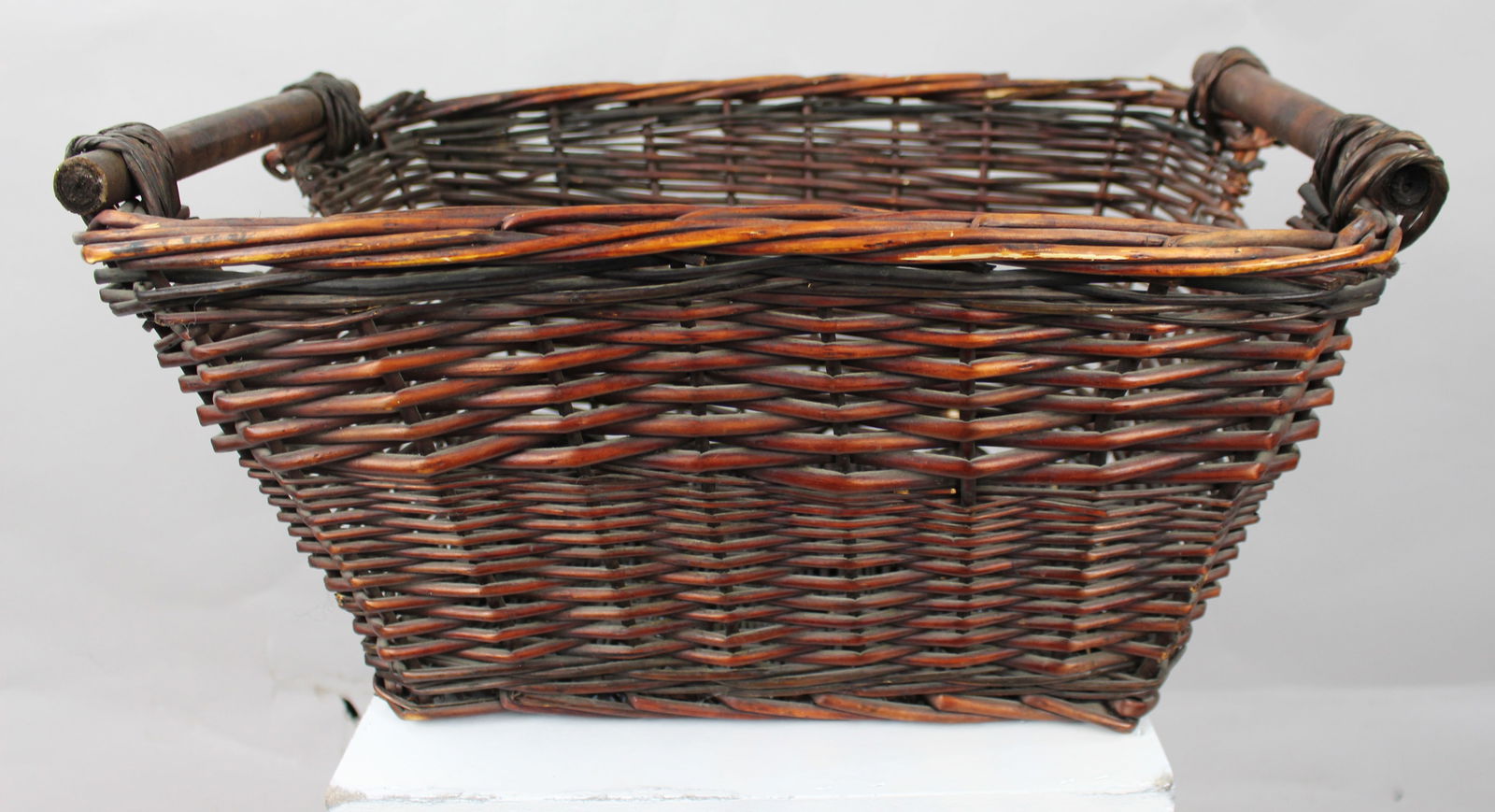 Vintage Wicker Two Handled Basket: Title: Vintage Wicker Two Handled Basket Description: Vintage Wicker Two Handled Basket Condition: Used Delivery